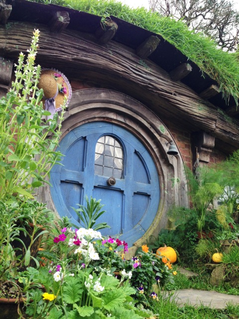 in a blue hobbit hole