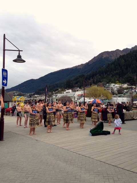 school of young dancers performing maori dances in queenstown