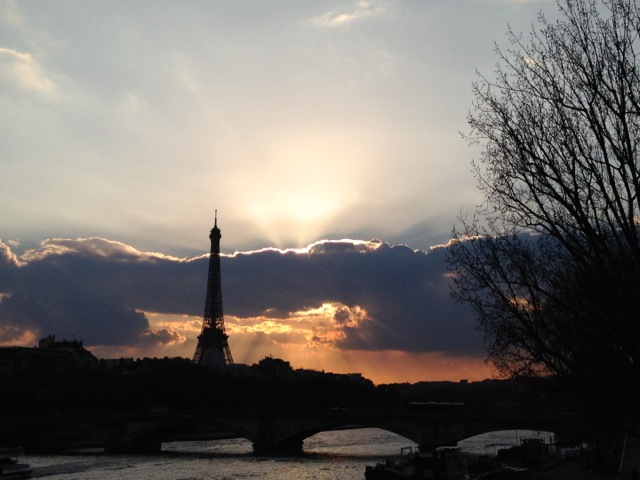 eiffel tower and the seine at sunset