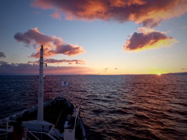 plancius saling into an Antarctic sunset